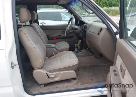 1999 Toyota Tacoma z USA, uszkodzony, nr VIN 4TAWN72N2XZ503270